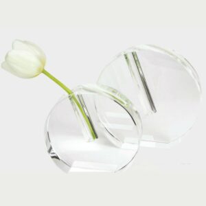 Tizo Design <a href="https://lifestylesgiftware.com/product/tizo-design-round-flat-crystal-glass-bud-vase/" target="_blank" rel="noopener noreferrer">Decorative Vase</a>