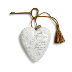 White ornamental heart with gold tassel and key